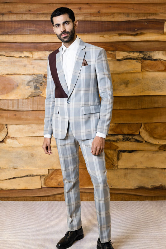Grey checks suit with brown chest patch